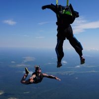 student deploys parachute during learn to skydive course