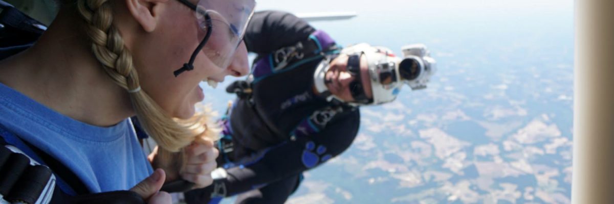 girl weighs skydiving risks before jumping