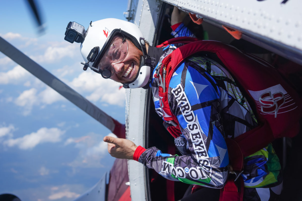 A skydiver prepares to jump.